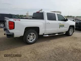 ✅ 2018 Chevrolet Silverado 1500 LT • VIN: 3GCUKREC4JG461928 • Лот: 59186463. Опубликован ранее на Copart с пробегом 124 987 миль. Бесплатный доступ к архиву аукционных продаж из США и подробный отчёт об истории автомобиля на DreamBid. Изображение 3.