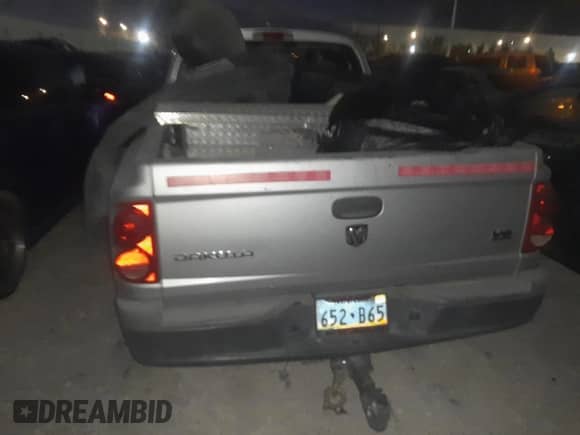 2005 Dodge Dakota ST с VIN 1D7HE28N95S181519, выставлен на аукционе Copart как лот 72847354 с пробегом 156 011 миль миль и На запчасти • Non repairable. История ставок и продаж доступна на DreamBid. Изображение 6.