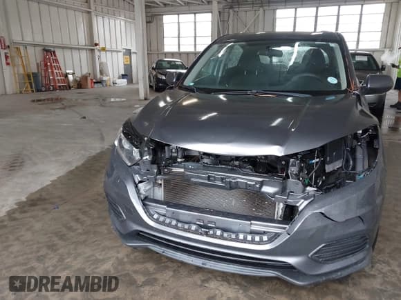 ✅ 2019 Honda HR-V LX • VIN: 3CZRU5H31KG701579 • Lot: 43312842. Wystawiony na IAAI z przebiegiem Nie podano. Bezpłatny archiwum sprzedaży aukcyjnych z USA i szczegółowy raport historii pojazdu na DreamBid. Zdjęcie 12.