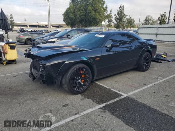 ✅ 2022 Dodge Challenger R/T Scat Pack Widebody • VIN: 2C3CDZFJXNH174915 • Lot: 54137444. Wystawiony na Copart z przebiegiem 12 265 mil. Bezpłatny archiwum sprzedaży aukcyjnych z USA i szczegółowy raport historii pojazdu na DreamBid. Zdjęcie 1.