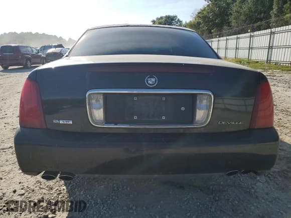 ✅ 2003 Cadillac DeVille • VIN: 1G6KD54Y43U218176 • Lot: 83851875. Listed on Copart with 130,690 mi. Free auction sales archive from the USA and detailed vehicle history report at DreamBid. Image 6.