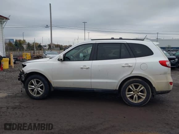 ✅ 2011 Hyundai Santa Fe Limited • VIN: 5XYZKDAG8BG088815 • Lot: 43718346. Listed on IAAI with 183,704 mi. Free auction sales archive from the USA and detailed vehicle history report at DreamBid. Image 14.