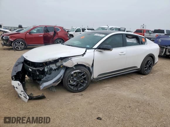 ✅ 2025 Kia K4 GT-Line Turbo • VIN: 3KPFW4DC9SE162482 • Lot: 81928815. Listed on Copart with 6,825 mi. Free auction sales archive from the USA and detailed vehicle history report at DreamBid. Image 1.