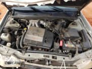 ✅ 2000 Toyota Avalon XL • VIN: 4T1BF28B6YU061880 • Lot: 89692185. Listed on Copart with 264,567 mi. Free auction sales archive from the USA and detailed vehicle history report at DreamBid. Image 11.