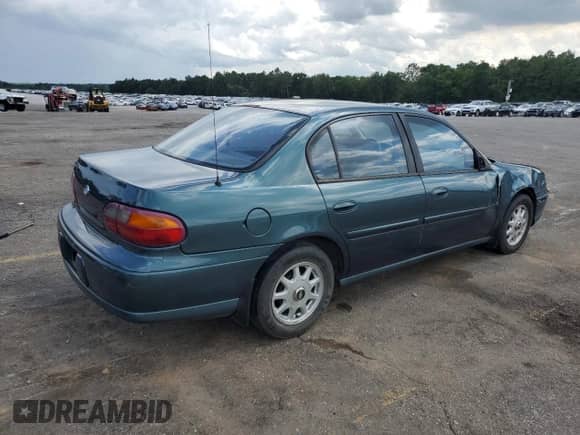 1997 Chevrolet Malibu LS z VIN 1G1NE52M1V6106426, wystawiony jako Copart lot #59802125 z przebiegiem 178 552 mil mil oraz Szkoda całkowita • Salvage title. Historia ofert i sprzedaży dostępna na DreamBid. Obrazek 3.