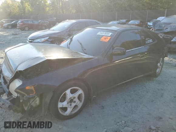 ✅ 1997 Honda Prelude • VIN: JHMBB6140VC009700 • Lot: 74457834. Listed on Copart with 225,274 mi. Free auction sales archive from the USA and detailed vehicle history report at DreamBid. Image 1.