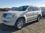 ✅ 2003 Lexus GX 470 • VIN: JTJBT20X130001412 • Lot: 87297785. Listed on Copart with 272,056 mi. Free auction sales archive from the USA and detailed vehicle history report at DreamBid. Image 1.