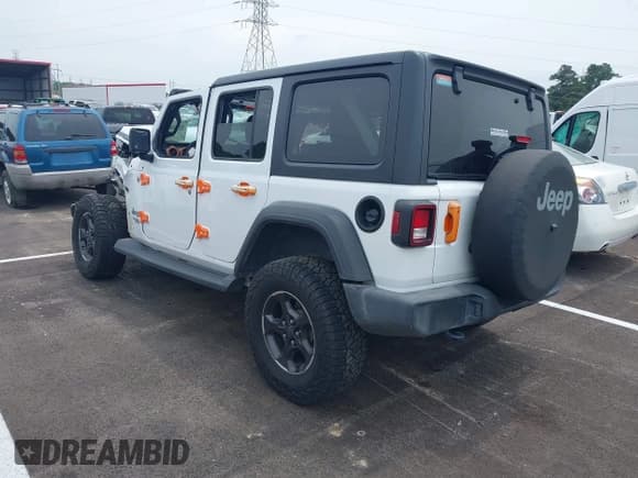 ✅ 2021 Jeep Wrangler Unlimited Sport S • VIN: 1C4HJXDN1MW648061 • Лот: 42426882. Опубликован ранее на IAAI с пробегом 99 008 миль. Бесплатный доступ к архиву аукционных продаж из США и подробный отчёт об истории автомобиля на DreamBid. Изображение 3.