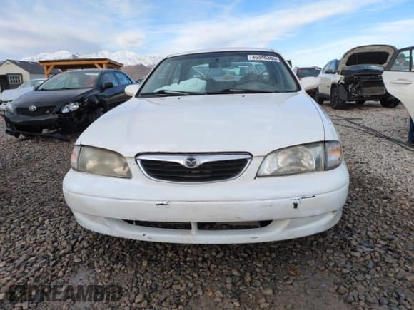 ✅ 1999 Mazda 626 ES • VIN: 1YVGF22C9X5887587 • Лот: 46346305. Опубликован ранее на Copart с пробегом 92 715 миль. Бесплатный доступ к архиву аукционных продаж из США и подробный отчёт об истории автомобиля на DreamBid. Изображение 5.