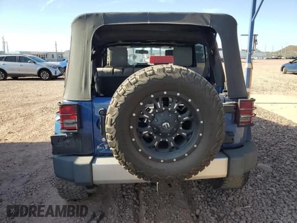 ✅ 2009 Jeep Wrangler Unlimited Sahara • VIN: 1J4GA59159L713079 • Lot: 68146845. Listed on Copart with Not provided. Free auction sales archive from the USA and detailed vehicle history report at DreamBid. Image 6.
