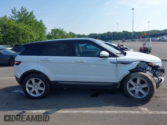 ✅ 2015 Land Rover Range Rover Evoque Pure Plus • VIN: SALVP2BG4FH044805 • Lot: 42649768. Wystawiony na IAAI z przebiegiem 66 663 mil. Bezpłatny archiwum sprzedaży aukcyjnych z USA i szczegółowy raport historii pojazdu na DreamBid. Zdjęcie 14.