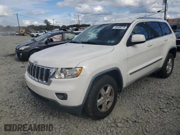 ✅ 2011 Jeep Grand Cherokee Laredo • VIN: 1J4RR4GG5BC562088 • Lot: 85536215. Listed on Copart with 151,797 mi. Free auction sales archive from the USA and detailed vehicle history report at DreamBid. Image 1.