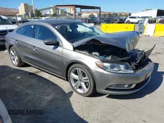 ✅ 2013 Volkswagen CC R-Line • VIN: WVWBP7AN5DE516953 • Lot: 42920630. Listed on IAAI with 107,428 mi. Free auction sales archive from the USA and detailed vehicle history report at DreamBid. Image 1.
