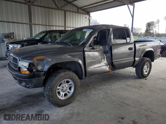 ✅ 2002 Dodge Dakota Sport • VIN: 1B7HG38N12S515919 • Lot: 42930835. Wystawiony na Copart z przebiegiem 180 701 mil. Bezpłatny archiwum sprzedaży aukcyjnych z USA i szczegółowy raport historii pojazdu na DreamBid. Zdjęcie 1.