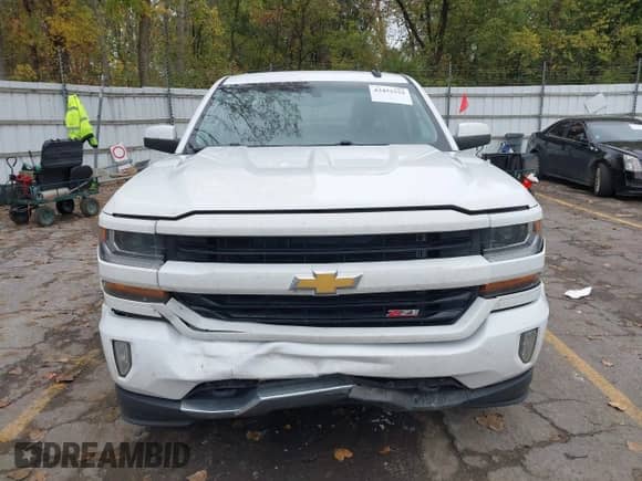 2016 Chevrolet Silverado 1500 LT z VIN 1GCVKREC1GZ305648, wystawiony jako IAAI lot #43452552 z przebiegiem 191 539 mil mil oraz . Historia ofert i sprzedaży dostępna na DreamBid. Obrazek 12.