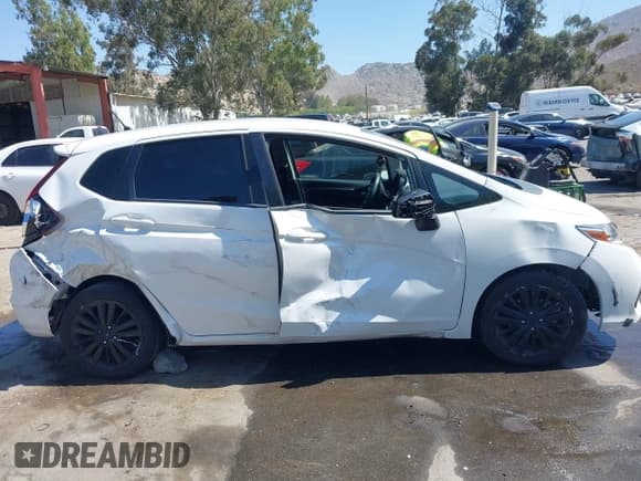 ✅ 2019 Honda Fit LX • VIN: 3HGGK5H4XKM703328 • Lot: 42384071. Listed on IAAI with 70,764 mi. Free auction sales archive from the USA and detailed vehicle history report at DreamBid. Image 13.