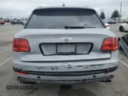 ✅ 2017 Bentley Bentayga W12 • VIN: SJAAC2ZV0HC015387 • Лот: 53551835. Опубликован ранее на Copart с пробегом 38 573 миль. Бесплатный доступ к архиву аукционных продаж из США и подробный отчёт об истории автомобиля на DreamBid. Изображение 6.