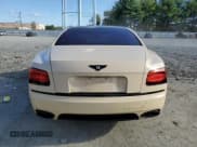 ✅ 2014 Bentley Flying Spur • VIN: SCBEC9ZA5EC089716 • Lot: 70884943. Wystawiony na Copart z przebiegiem Nie podano. Bezpłatny archiwum sprzedaży aukcyjnych z USA i szczegółowy raport historii pojazdu na DreamBid. Zdjęcie 6.