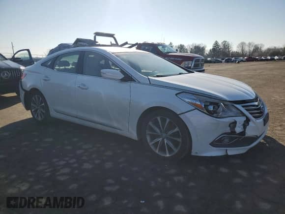 2015 Hyundai Azera z VIN KMHFG4JG7FA442796, wystawiony jako Copart lot #45759345 z przebiegiem 129 040 mil mil oraz Szkoda całkowita • Salvage title. Historia ofert i sprzedaży dostępna na DreamBid. Obrazek 4.