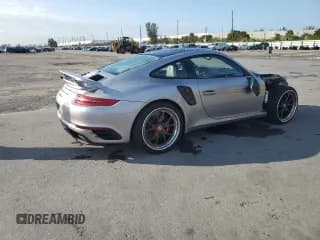 ✅ 2017 Porsche 911 Turbo S • VIN: WP0AD2A91HS166271 • Lot: 37253183. Wystawiony na Copart z przebiegiem 30 233 mil. Bezpłatny archiwum sprzedaży aukcyjnych z USA i szczegółowy raport historii pojazdu na DreamBid. Zdjęcie 3.