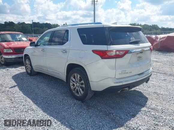 2018 Chevrolet Traverse High Country z VIN 1GNEVKKW8JJ269807, wystawiony jako IAAI lot #43320195 z przebiegiem 126 490 mil mil oraz . Historia ofert i sprzedaży dostępna na DreamBid. Obrazek 3.