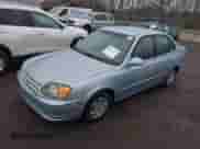 2003 Hyundai Accent GL z VIN KMHCG45C33U473080, wystawiony jako IAAI lot #41868765 z przebiegiem 57 478 mil mil oraz . Historia ofert i sprzedaży dostępna na DreamBid. Obrazek 2.