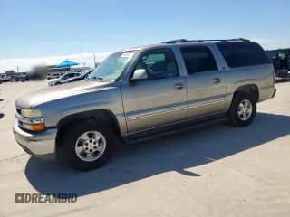 2001 Chevrolet Suburban LS z VIN 1GNEC16T31J301479, wystawiony jako Copart lot #66129015 z przebiegiem 222 248 mil mil oraz Czysty tytuł • Clean title. Historia ofert i sprzedaży dostępna na DreamBid. Obrazek 1.