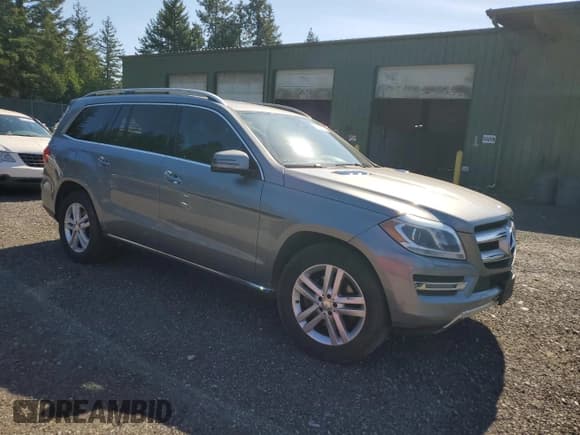 ✅ 2014 Mercedes-Benz GL 450 • VIN: 4JGDF7CEXEA327454 • Lot: 83857585. Listed on Copart with 97,595 mi. Free auction sales archive from the USA and detailed vehicle history report at DreamBid. Image 4.