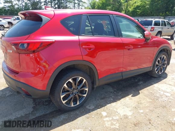 ✅ 2016 Mazda CX-5 Grand Touring • VIN: JM3KE2DY5G0796669 • Lot: 42168522. Wystawiony na IAAI z przebiegiem 147 914 mil. Bezpłatny archiwum sprzedaży aukcyjnych z USA i szczegółowy raport historii pojazdu na DreamBid. Zdjęcie 4.