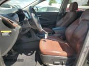 ✅ 2014 Hyundai Santa Fe Limited • VIN: KM8SN4HF9EU037697 • Лот: 66934955. Опубликован ранее на Copart с пробегом 144 499 миль. Бесплатный доступ к архиву аукционных продаж из США и подробный отчёт об истории автомобиля на DreamBid. Изображение 7.