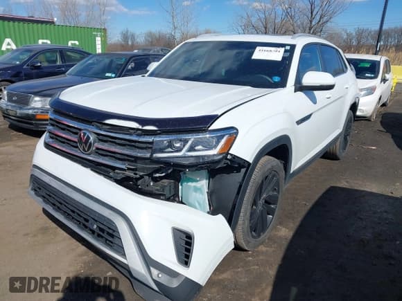 ✅ 2022 Volkswagen Atlas SE • VIN: 1V2JE2CAXNC211975 • Lot: 41668404. Wystawiony na IAAI z przebiegiem 17 983 mil. Bezpłatny archiwum sprzedaży aukcyjnych z USA i szczegółowy raport historii pojazdu na DreamBid. Zdjęcie 17.