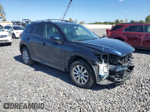 ✅ 2014 Mazda CX-5 Touring • VIN: JM3KE4CY6E0404096 • Lot: 82155355. Wystawiony na Copart z przebiegiem 105 301 mil. Bezpłatny archiwum sprzedaży aukcyjnych z USA i szczegółowy raport historii pojazdu na DreamBid. Zdjęcie 4.
