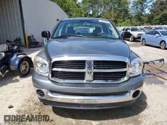 2007 Dodge 1500 SLT z VIN 1D7HU18P77S264612, wystawiony jako Copart lot #69960934 z przebiegiem 202 037 mil mil oraz Szkoda całkowita • Salvage title. Historia ofert i sprzedaży dostępna na DreamBid. Obrazek 5.