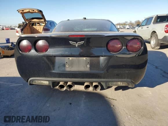 2005 Chevrolet Corvette с VIN 1G1YY24U555117595, выставлен на аукционе Copart как лот 79526124 с пробегом 174 641 миль миль и Списание • Salvage title. История ставок и продаж доступна на DreamBid. Изображение 6.