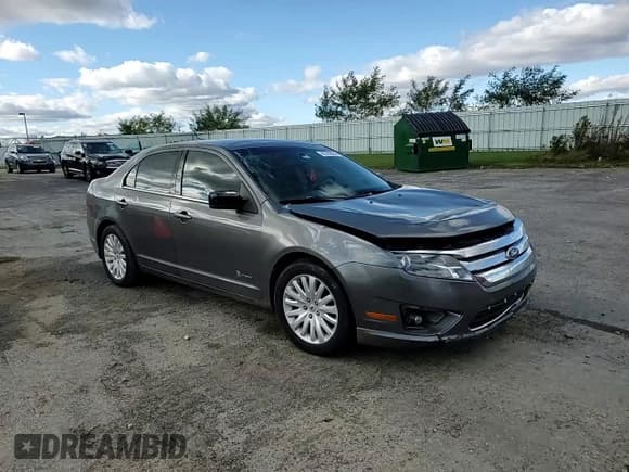 ✅ 2011 Ford Fusion Hybrid • VIN: 3FADP0L38BR214858 • Lot: 82742055. Listed on Copart with 186,252 mi. Free auction sales archive from the USA and detailed vehicle history report at DreamBid. Image 13.