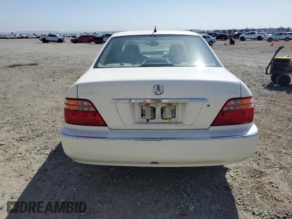 ✅ 2002 Acura RL • VIN: JH4KA96522C011028 • Lot: 61027505. Listed on Copart with 104,094 mi. Free auction sales archive from the USA and detailed vehicle history report at DreamBid. Image 6.