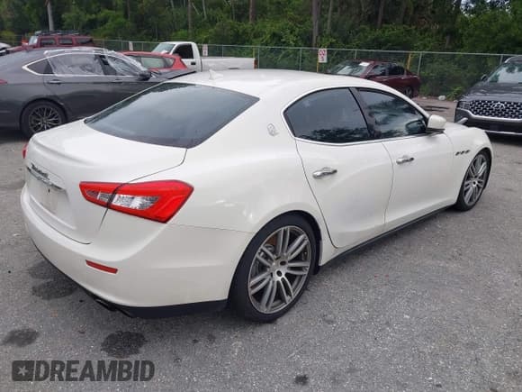 ✅ 2015 Maserati Ghibli • VIN: ZAM57XSA8F1129800 • Lot: 42583422. Listed on IAAI with 132,127 mi. Free auction sales archive from the USA and detailed vehicle history report at DreamBid. Image 4.