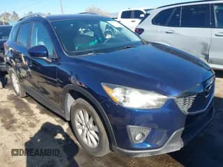 ✅ 2013 Mazda CX-5 Touring • VIN: JM3KE2CE2D0141517 • Lot: 43911717. Listed on IAAI with 283,088 mi. Free auction sales archive from the USA and detailed vehicle history report at DreamBid. Image 1.