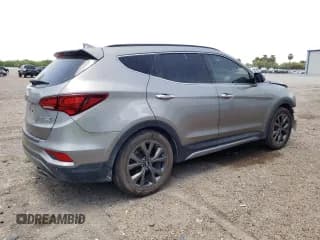 ✅ 2018 Hyundai Santa Fe Ultimate • VIN: 5NMZW4LA6JH077507 • Лот: 61937343. Опубликован ранее на Copart с пробегом 74 278 миль. Бесплатный доступ к архиву аукционных продаж из США и подробный отчёт об истории автомобиля на DreamBid. Изображение 3.