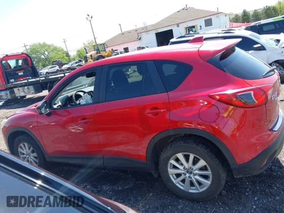 ✅ 2014 Mazda CX-5 Touring • VIN: JM3KE4CY5E0318214 • Lot: 42252680. Wystawiony na IAAI z przebiegiem 102 255 mil. Bezpłatny archiwum sprzedaży aukcyjnych z USA i szczegółowy raport historii pojazdu na DreamBid. Zdjęcie 14.