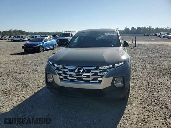 2023 Hyundai Santa Cruz SEL z VIN 5NTJBDAE4PH060653, wystawiony jako Copart lot #82682805 z przebiegiem 33 020 mil mil oraz Szkoda całkowita • Salvage title. Historia ofert i sprzedaży dostępna na DreamBid. Obrazek 13.