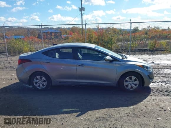 ✅ 2016 Hyundai Elantra SE • VIN: 5NPDH4AE0GH664856 • Lot: 43589845. Listed on IAAI with 159,288 mi. Free auction sales archive from the USA and detailed vehicle history report at DreamBid. Image 13.