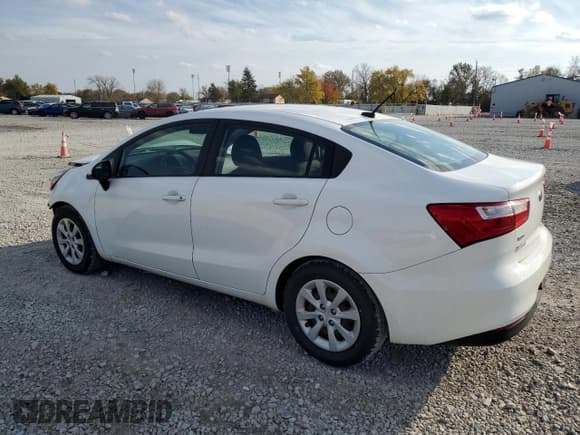 ✅ 2016 Kia Rio LX • VIN: KNADM4A34G6599138 • Лот: 90744625. Опубликован ранее на Copart с пробегом 166 564 миль. Бесплатный доступ к архиву аукционных продаж из США и подробный отчёт об истории автомобиля на DreamBid. Изображение 2.
