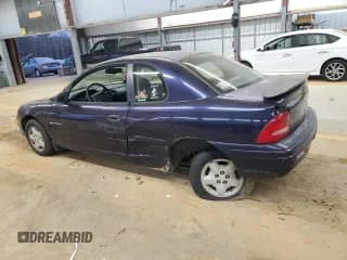 ✅ 1998 Dodge Neon • VIN: 1B3ES42Y8WD642673 • Lot: 85553634. Listed on Copart with 146,232 mi. Free auction sales archive from the USA and detailed vehicle history report at DreamBid. Image 2.