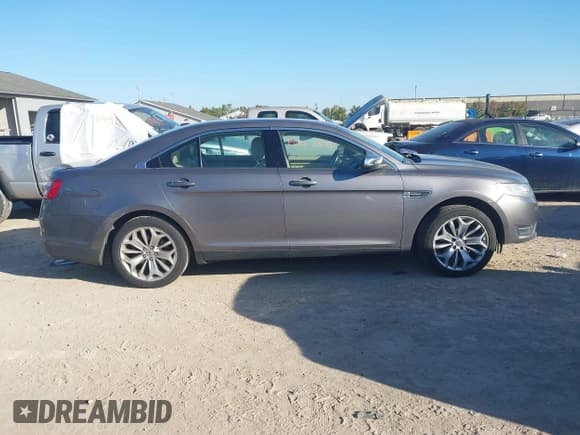 ✅ 2013 Ford Taurus Limited • VIN: 1FAHP2F80DG231071 • Lot: 43360372. Listed on IAAI with 166,411 mi. Free auction sales archive from the USA and detailed vehicle history report at DreamBid. Image 13.