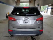 ✅ 2014 Hyundai Santa Fe • VIN: 5XYZU3LA6EG207690 • Лот: 63659934. Опубликован ранее на Copart с пробегом 76 843 миль. Бесплатный доступ к архиву аукционных продаж из США и подробный отчёт об истории автомобиля на DreamBid. Изображение 6.
