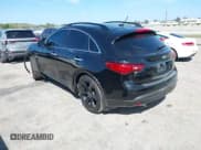 ✅ 2016 Infiniti QX70 • VIN: JN8CS1MUXGM671824 • Lot: 41741343. Listed on IAAI with 129,541 mi. Free auction sales archive from the USA and detailed vehicle history report at DreamBid. Image 3.