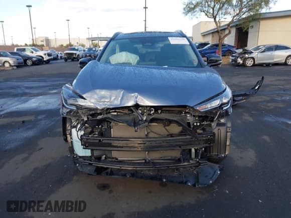 ✅ 2025 Toyota Corolla Cross LE • VIN: 7MUBAABG0SV124104 • Лот: 43229248. Опубликован ранее на IAAI с пробегом 6 570 миль. Бесплатный доступ к архиву аукционных продаж из США и подробный отчёт об истории автомобиля на DreamBid. Изображение 12.