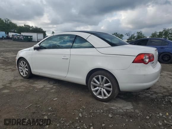 ✅ 2011 Volkswagen Eos Komfort • VIN: WVWBW7AH2BV003170 • Лот: 55771285. Опубликован ранее на Copart с пробегом 129 847 миль. Бесплатный доступ к архиву аукционных продаж из США и подробный отчёт об истории автомобиля на DreamBid. Изображение 2.