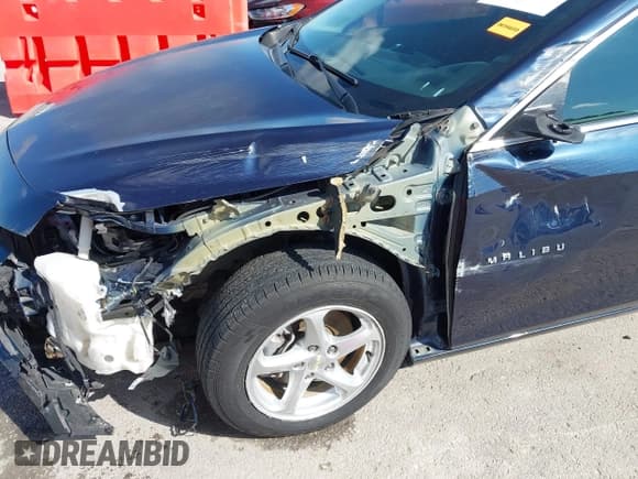 ✅ 2017 Chevrolet Malibu LS • VIN: 1G1ZB5ST6HF165297 • Lot: 43293408. Listed on IAAI with 144,427 mi. Free auction sales archive from the USA and detailed vehicle history report at DreamBid. Image 6.